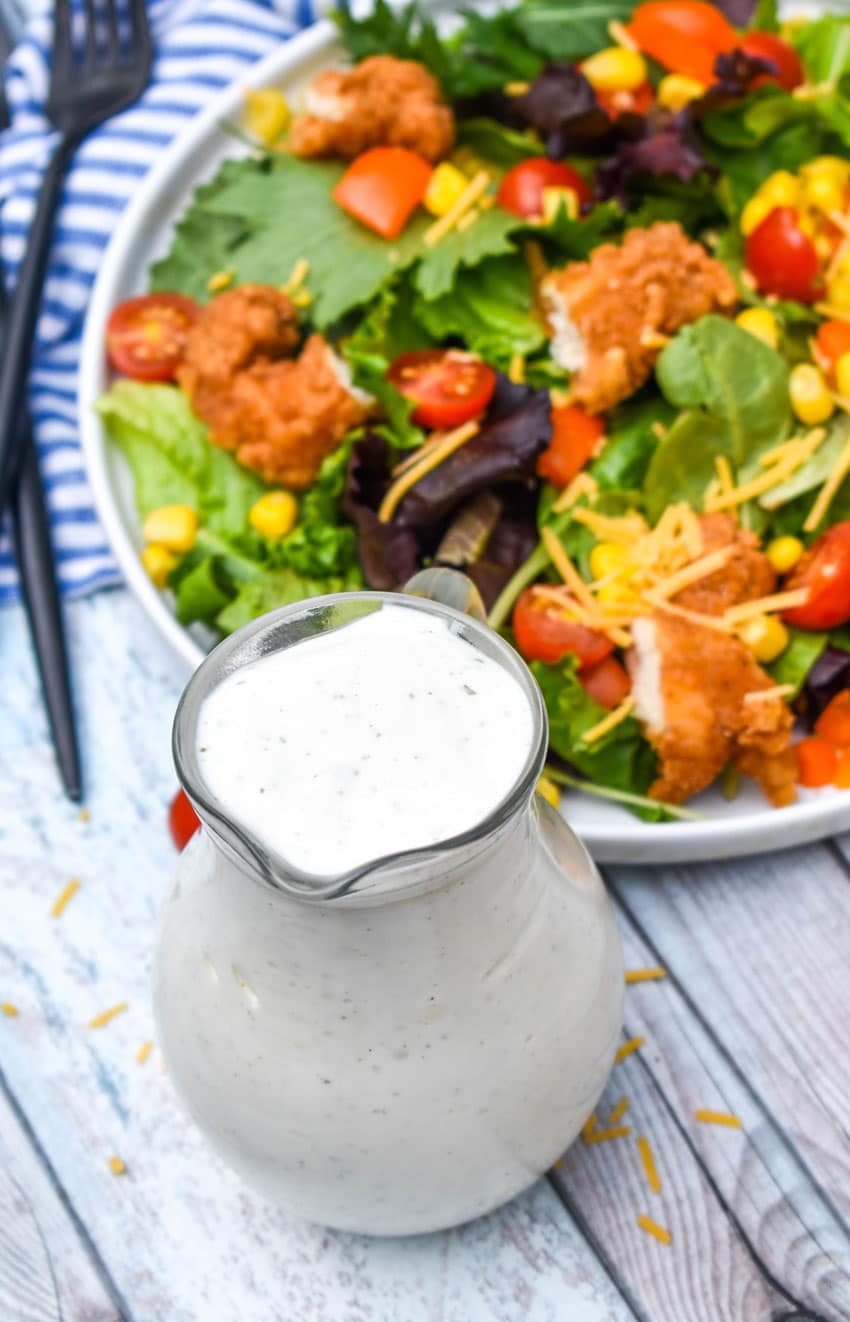 tiktok cottage cheese ranch dressing in a small glass pitcher