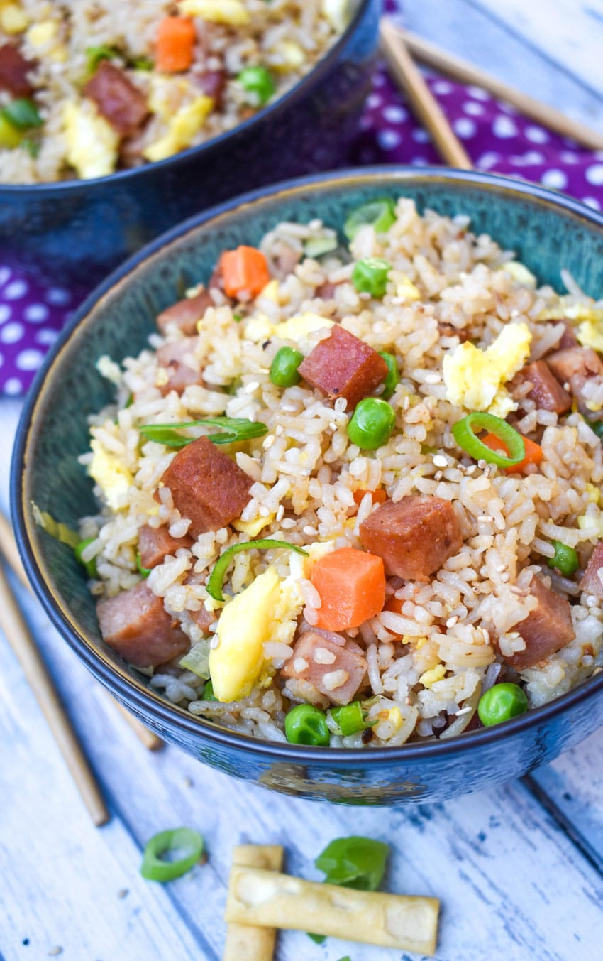 spam fried rice in a blue bowl