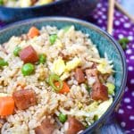 spam fried rice in a blue bowl