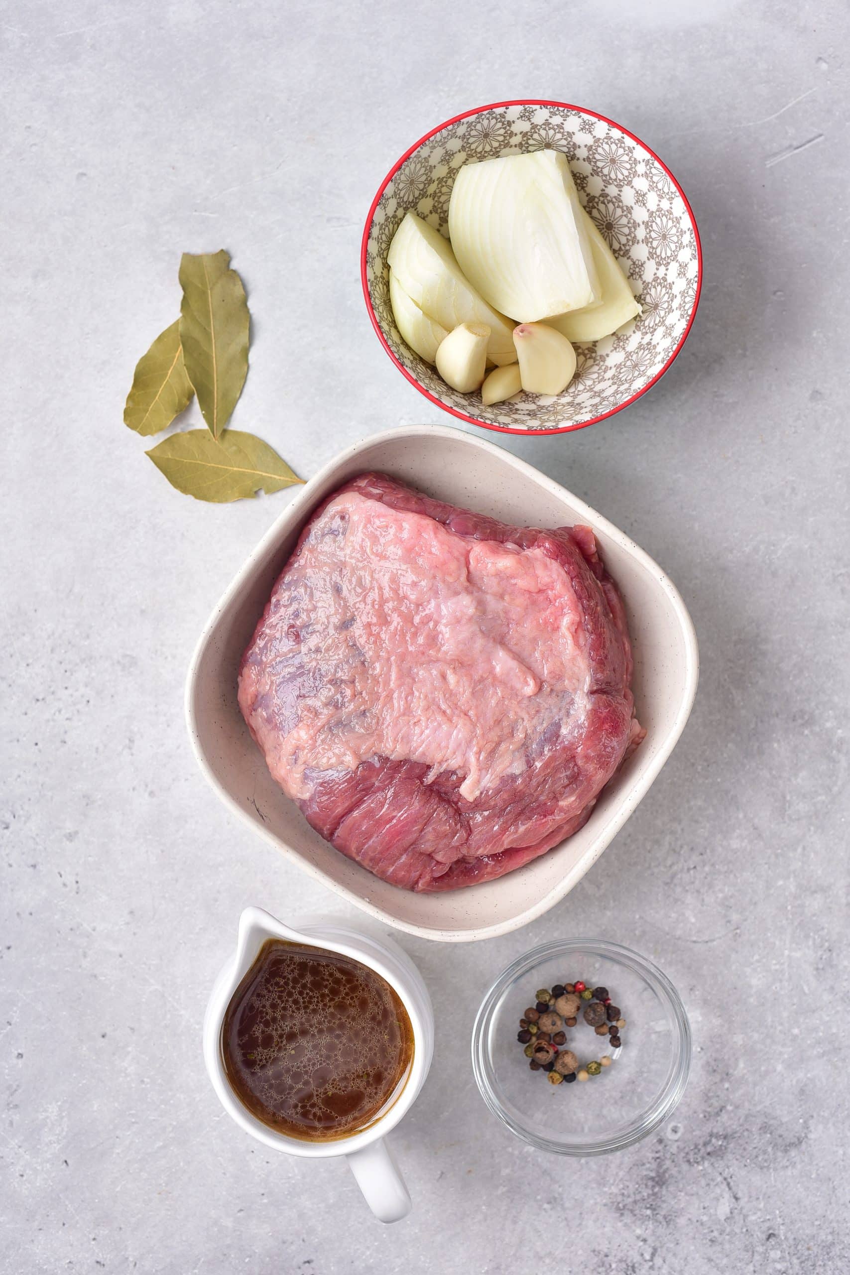 an overhead image showing the measured ingredients need to make corned beef and cabbage in the instant pot