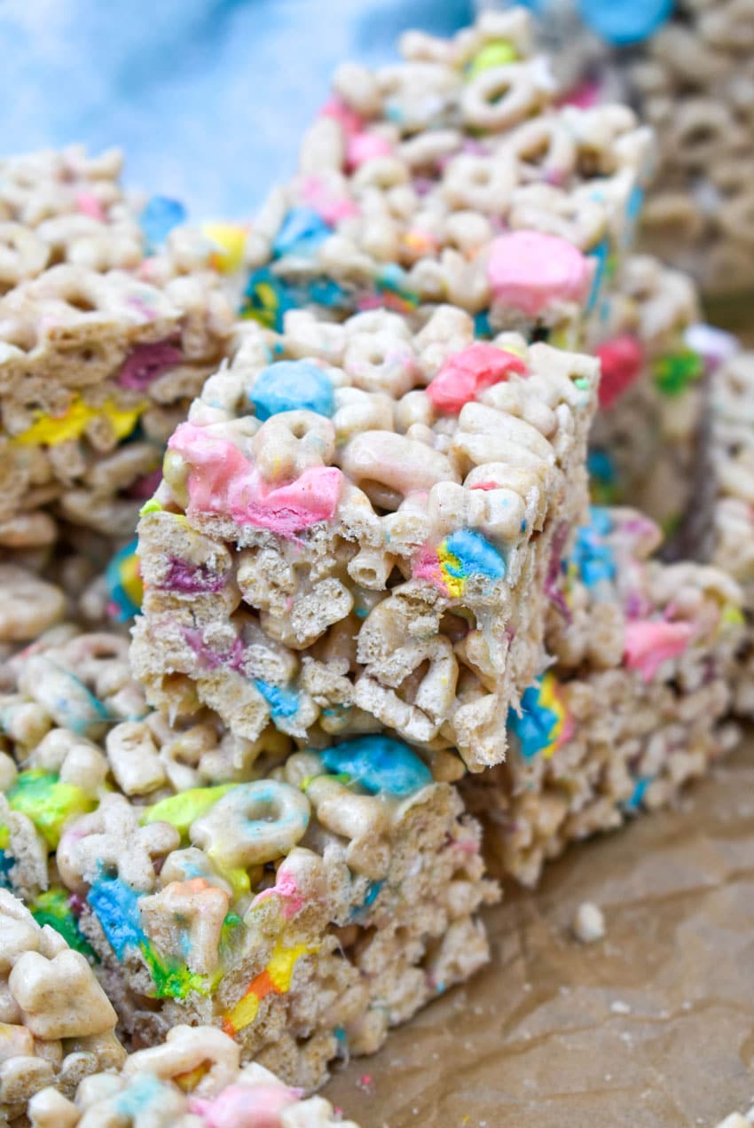 Lucky Charms Treats a stack of lucky charms treats on wrinkled brown parchment paper