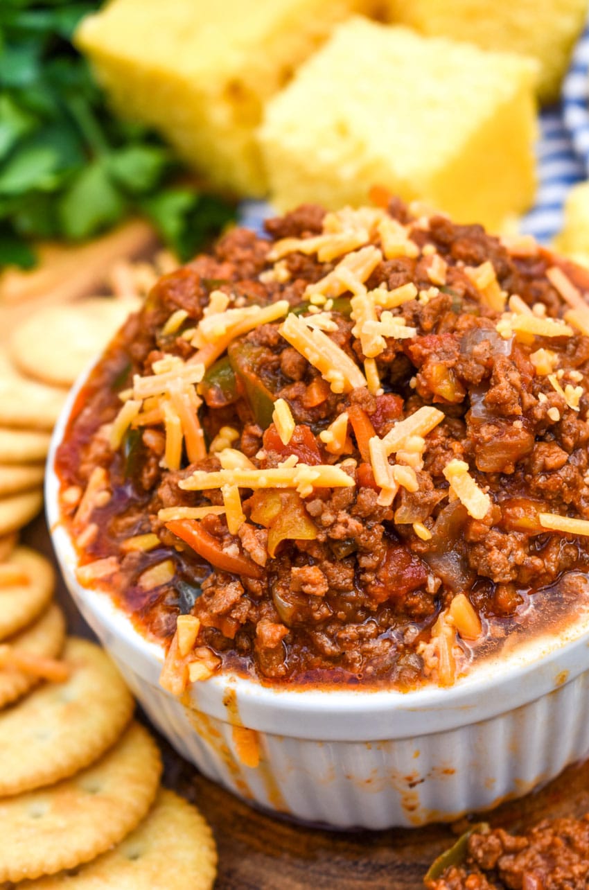 Easy No Bean Chili Recipe easy no bean chili recipe in a white bowl topped with shredded cheese