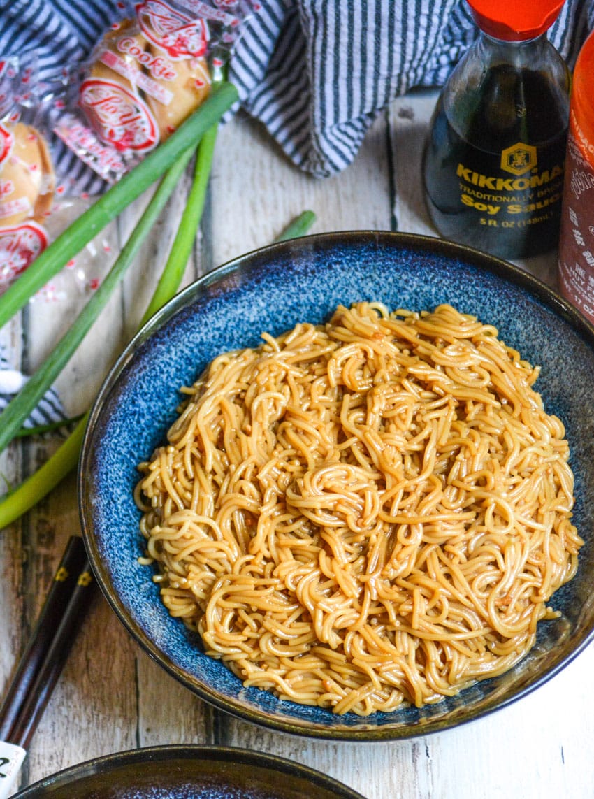 sesame garlic ramen noodles in a blue bowl
