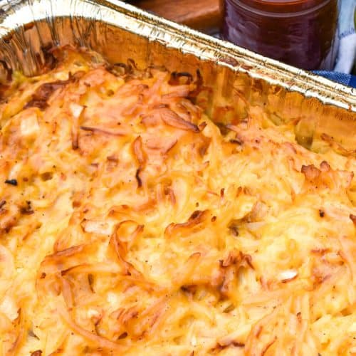 cheesy smoked potatoes in a 9x13 aluminum tin