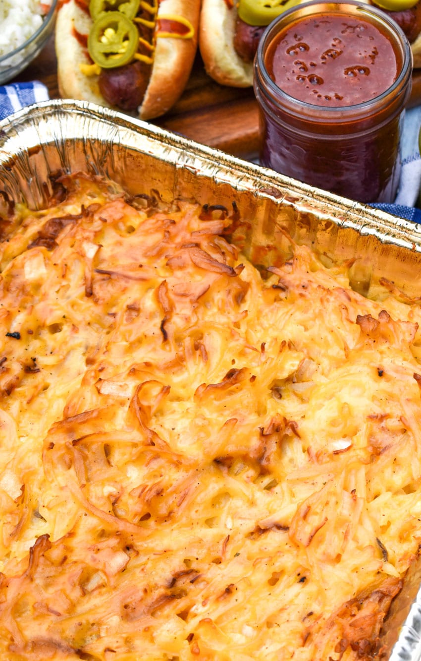 cheesy smoked potatoes in a 9x13 aluminum tin