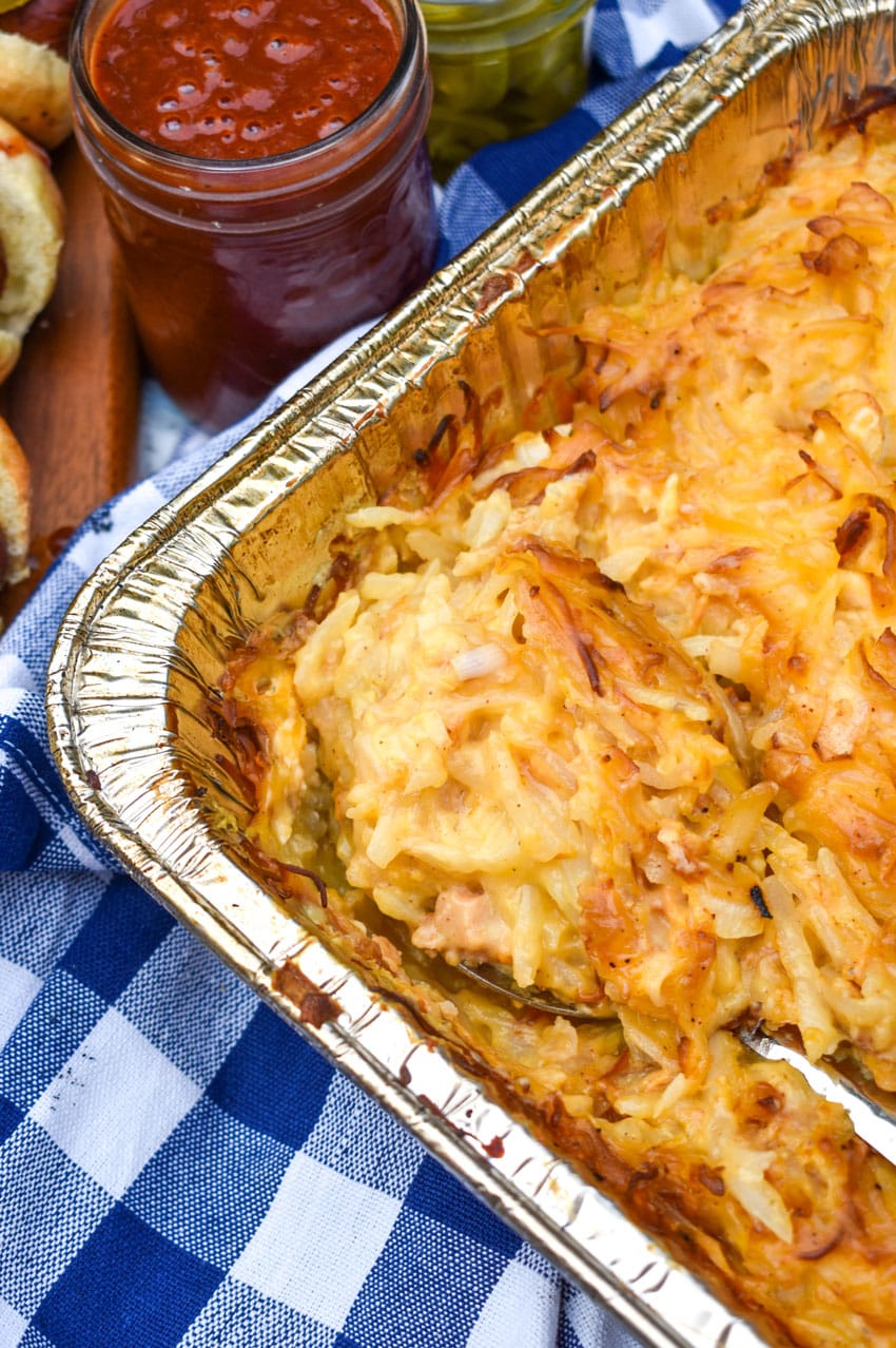 cheesy smoked potatoes in a 9x13 aluminum tin