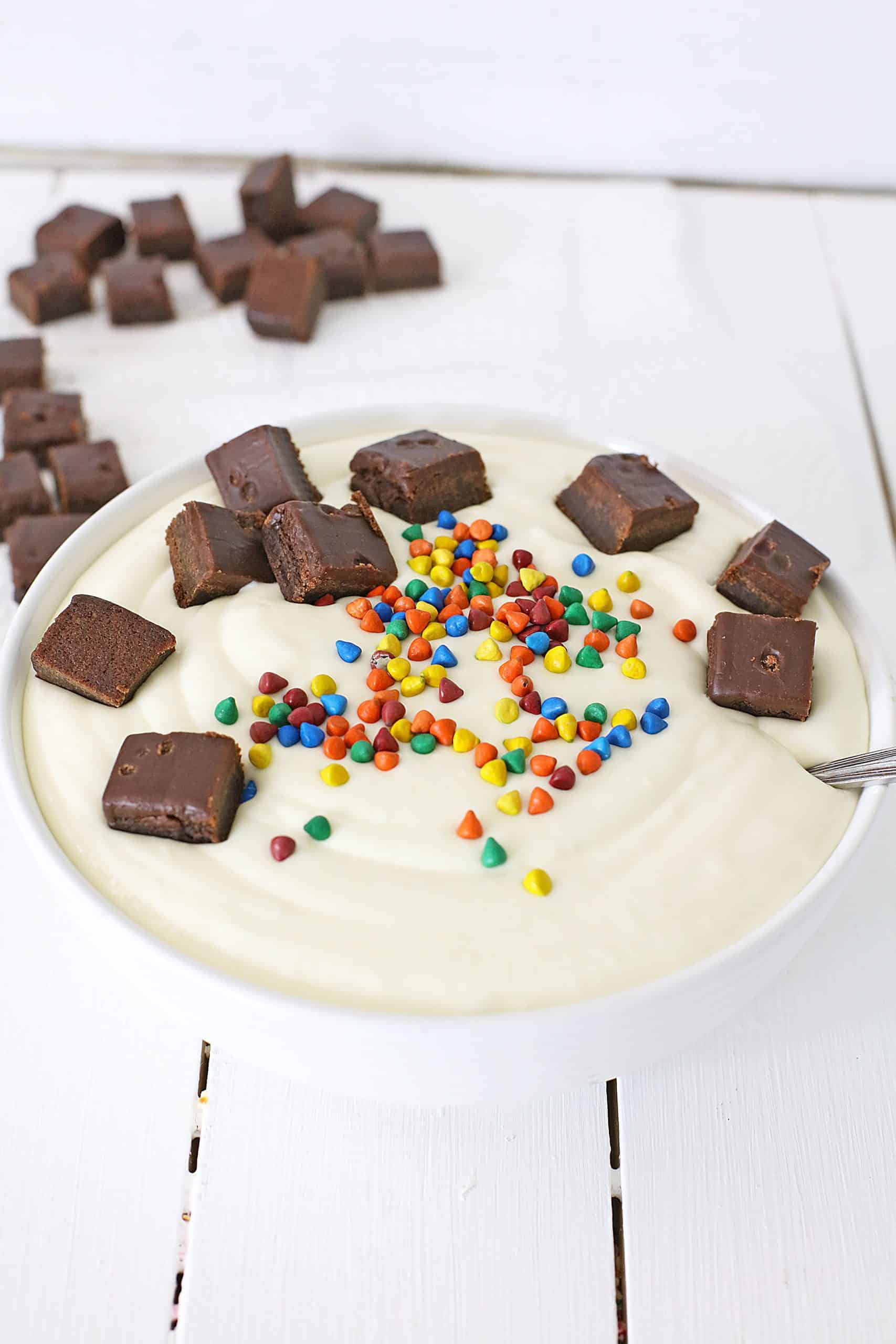 cosmic brownie cheesecake filling in a small white bowl