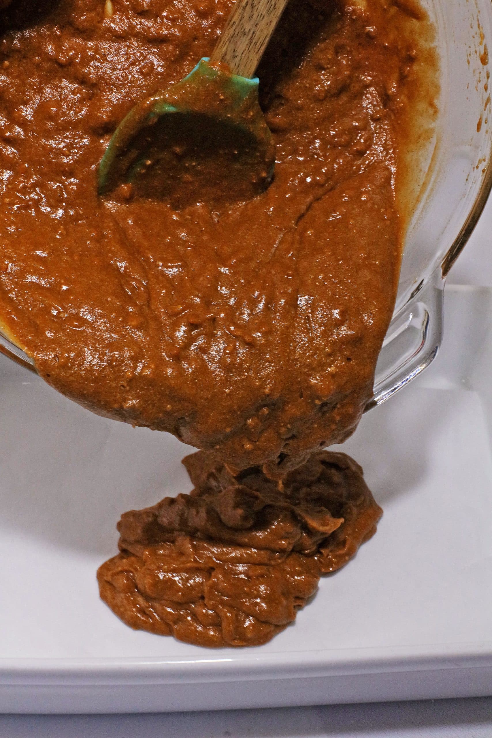 cream soda carrot cake batter being poured into a 9x13 inch baking dish