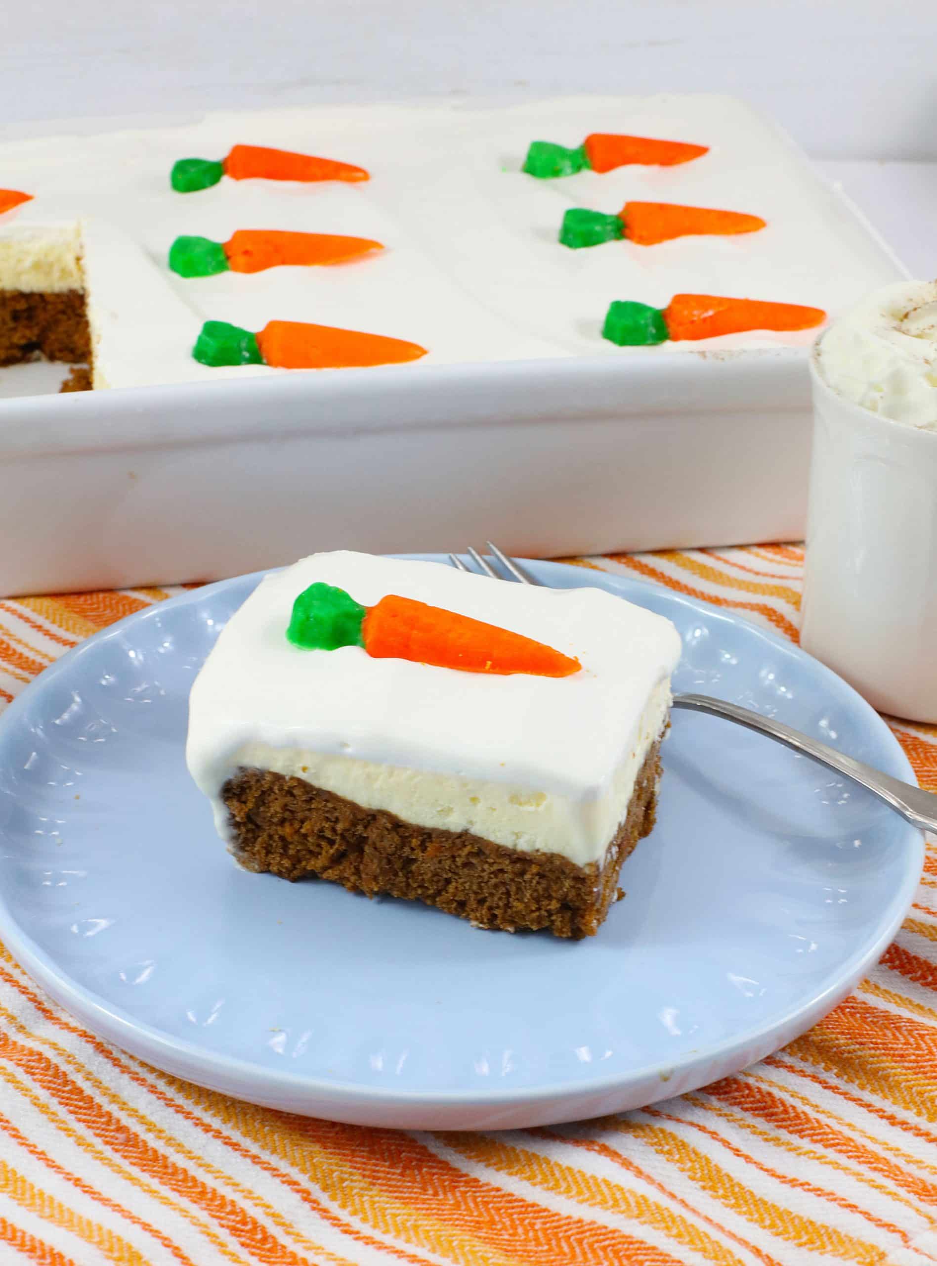 a slice of carrot cake ice cream cake on a light blue plate