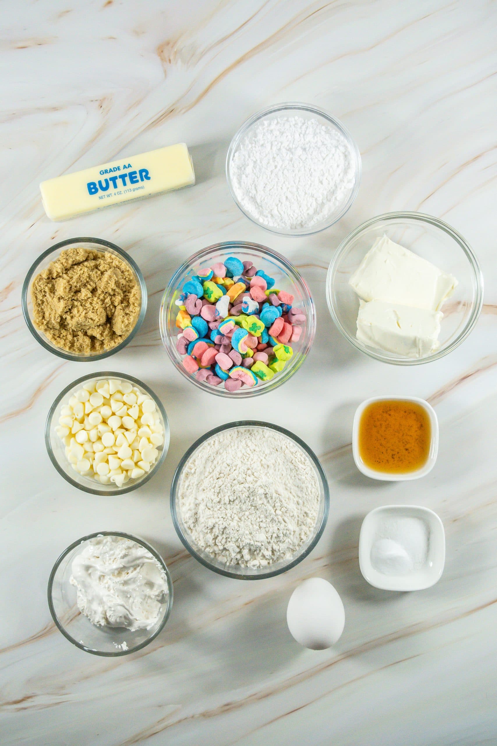 an overhead image showing the measured ingredients needed to make a batch of lucky charms cookies
