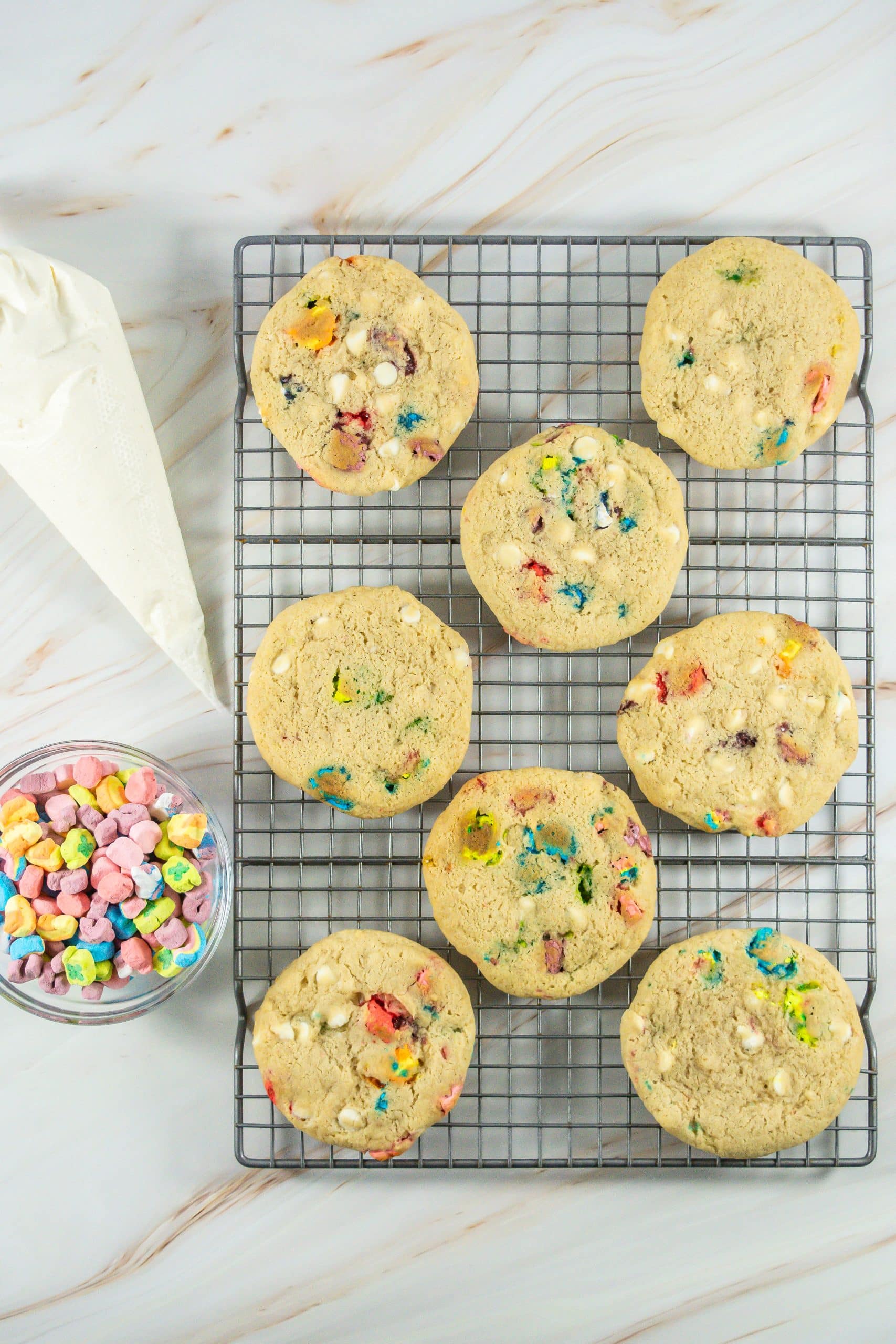 lucky charms cookies on a wire cooling rack