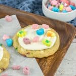 lucky charms cookies on a wooden cutting board