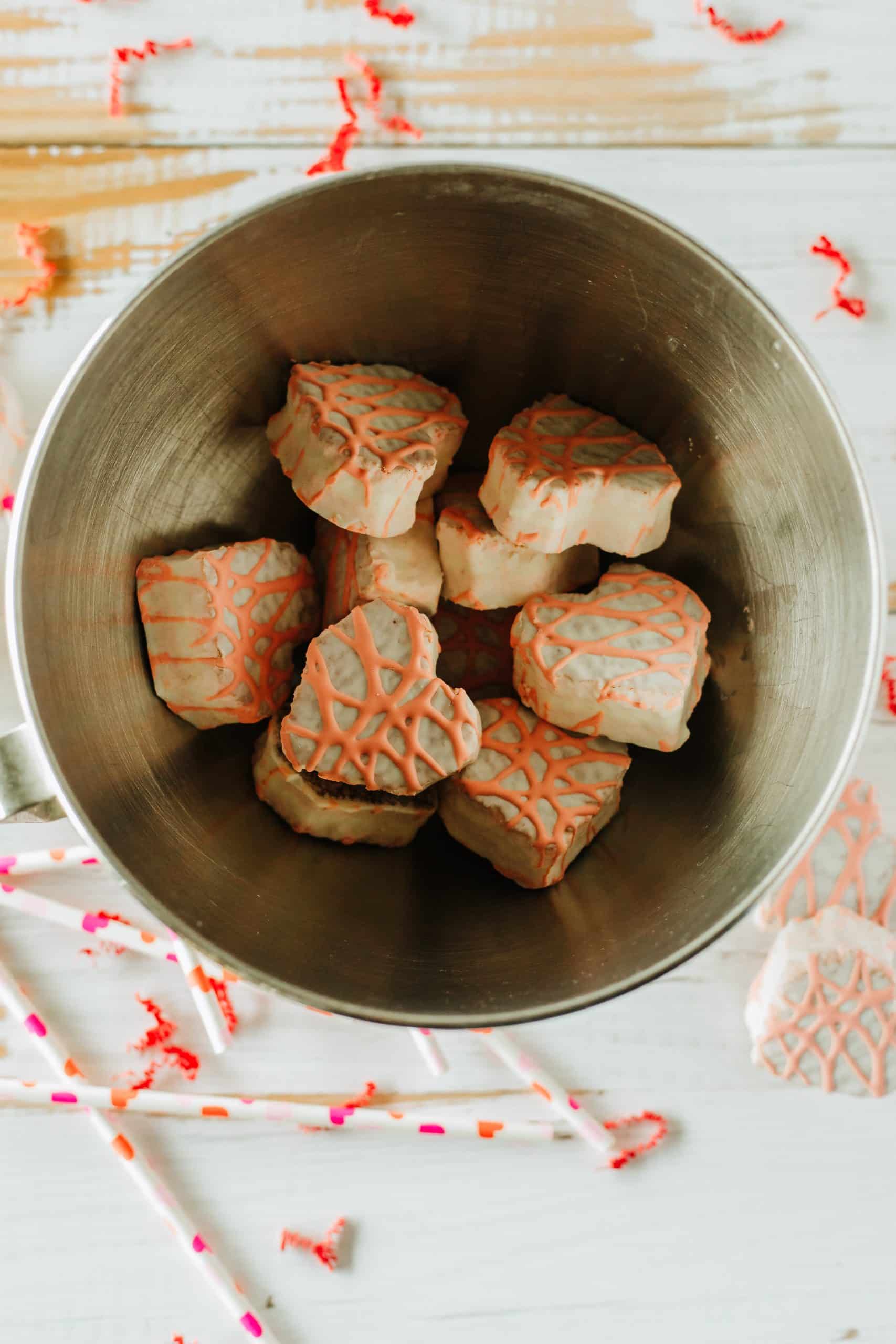 little debbie valentine snack cakes in a metal mixing bowl