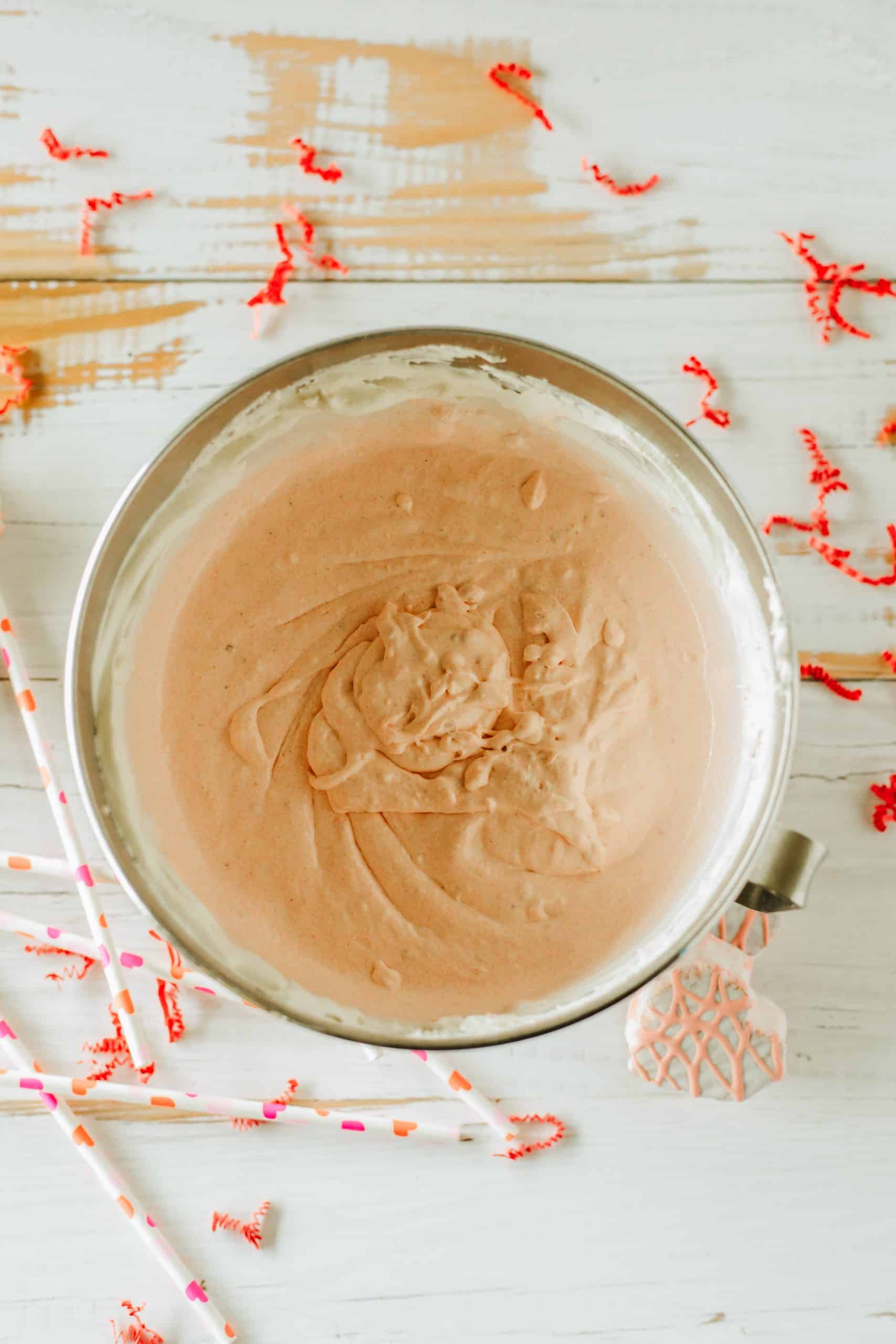 creamy little debbie valentine dessert dip in a metal mixing bowl