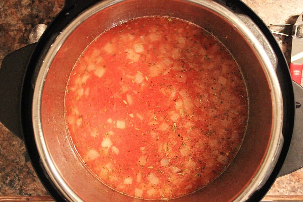 tomato soup in the bowl of an instant pot
