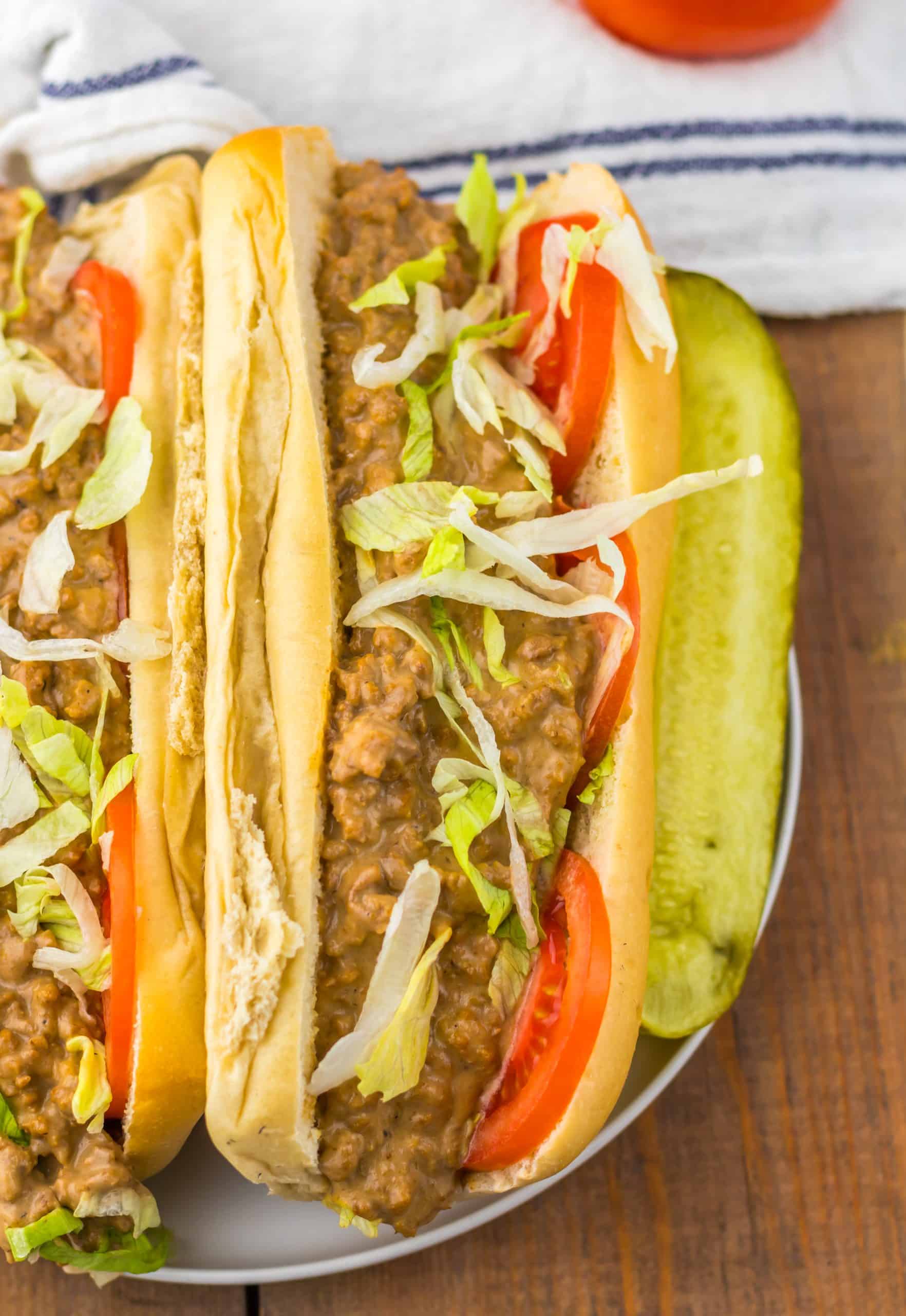 slow cooker chopped cheese sandwiches on a white plate