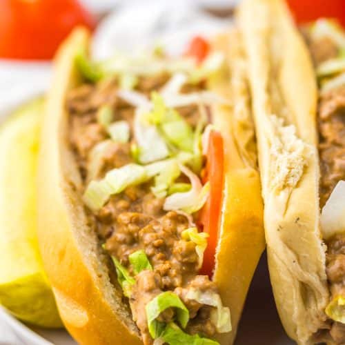 slow cooker chopped cheese sandwiches on a white plate