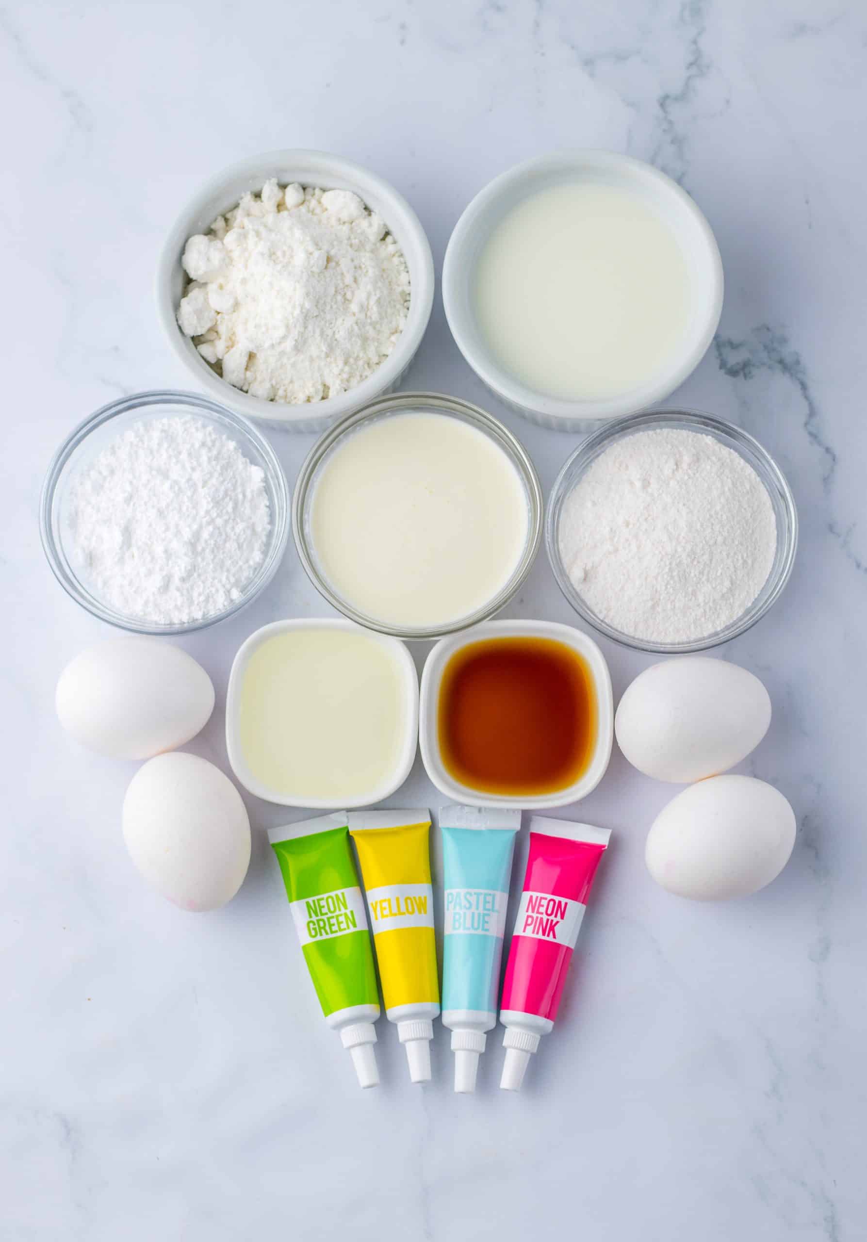 an overhead image showing the measured ingredients needed to make an easter poke cake