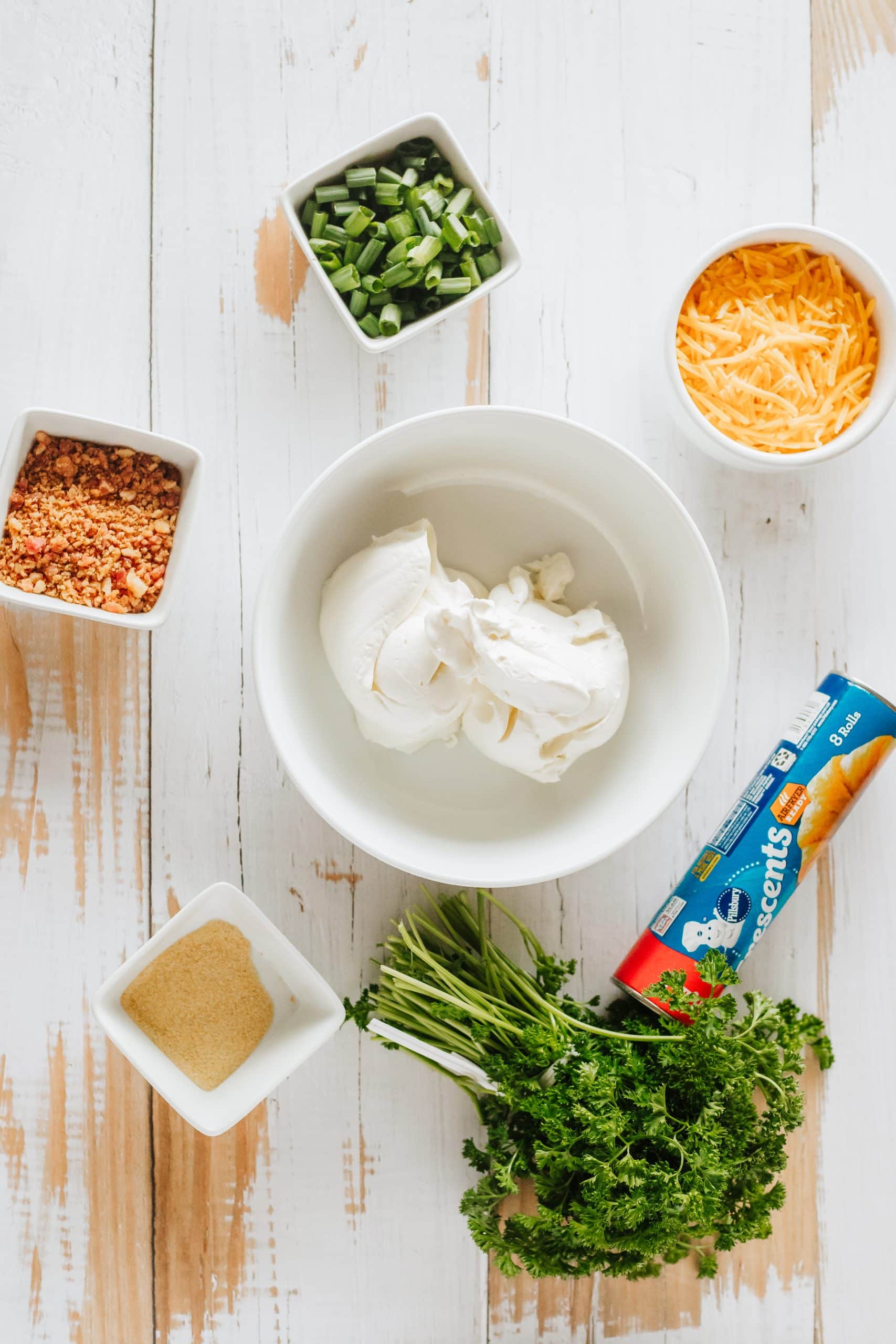an overhead image showing the measured ingredients needed to make a batch of carrot stuffed crescent rolls