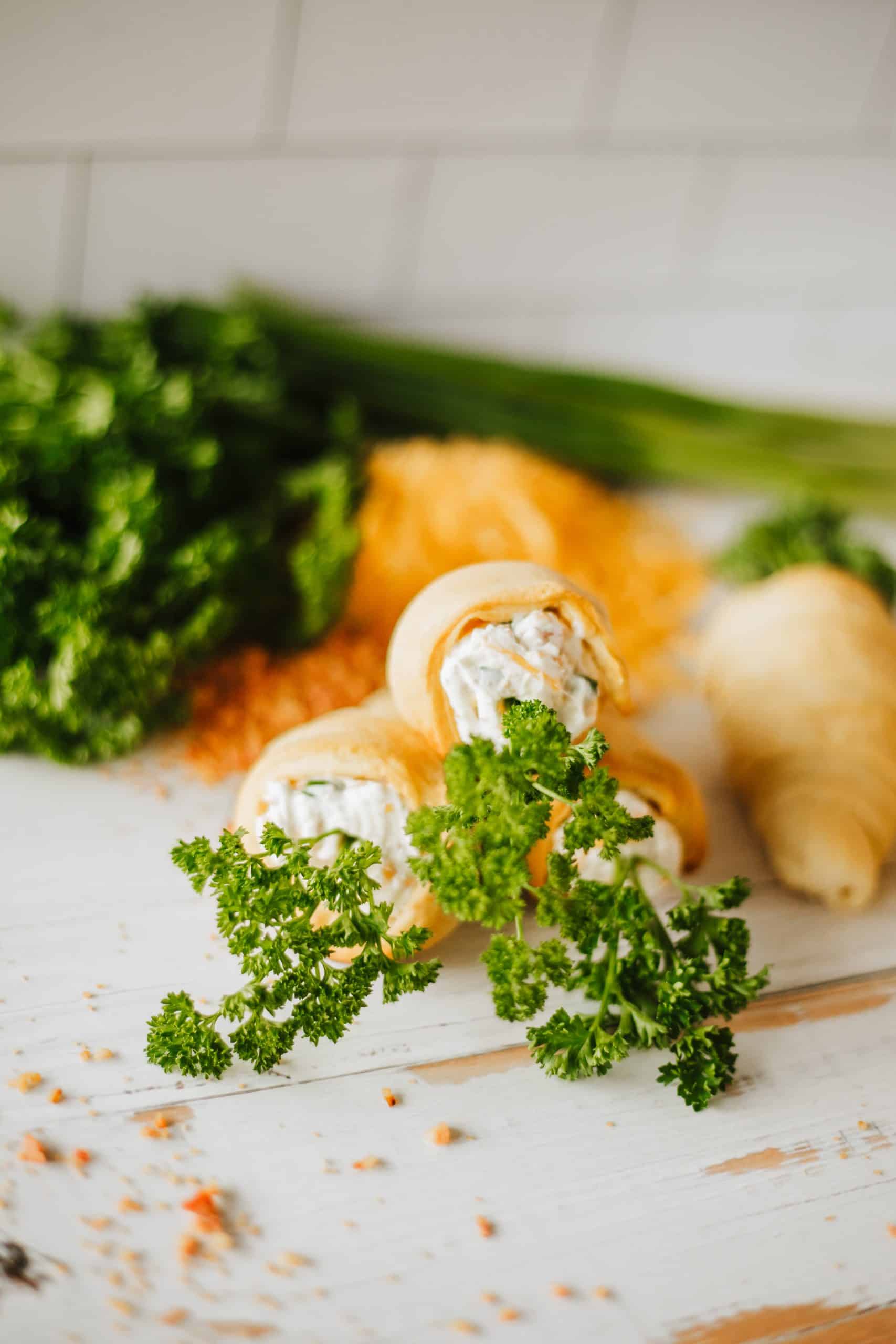carrot crescent rolls on a wooden tabletop