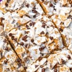 a close up of cut s'mores cereal bars on a sheet of white parchment paper