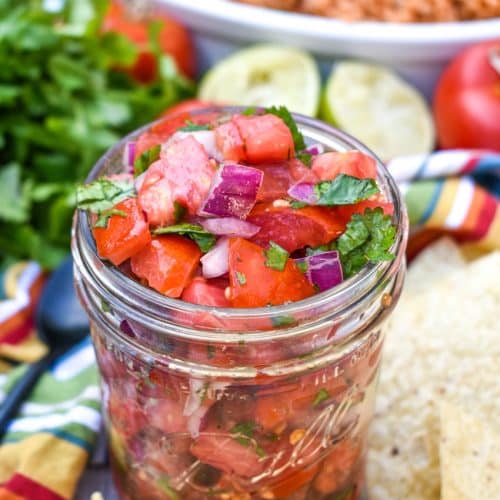 homemade pico de gallo in a small glass jar
