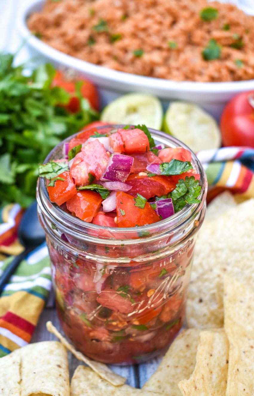 homemade pico de gallo in a small glass jar
