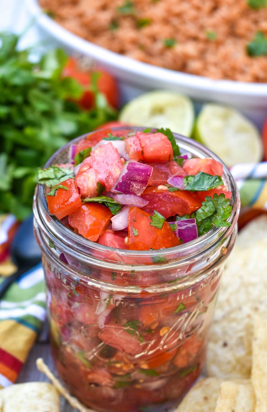 homemade pico de gallo in a small glass jar