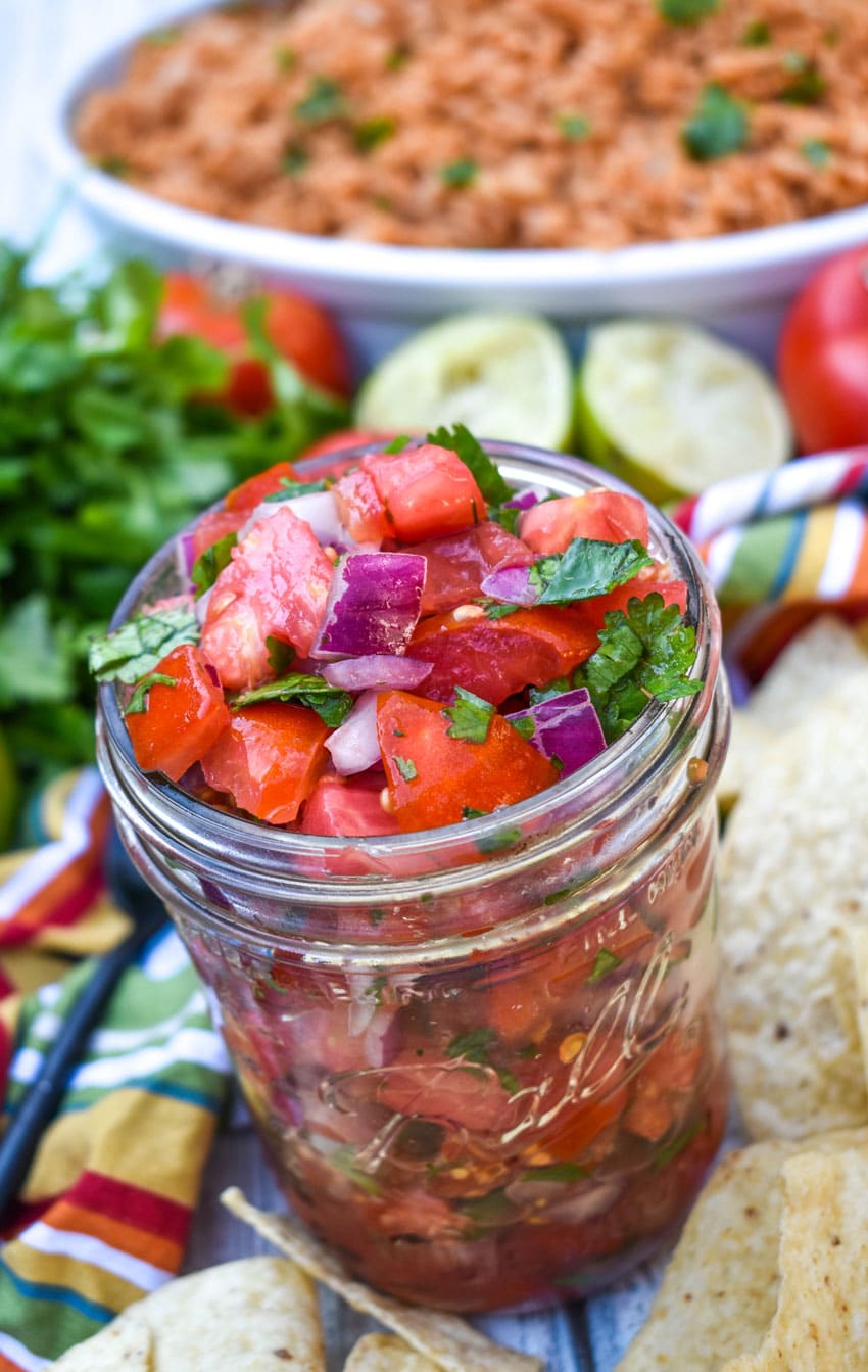 homemade pico de gallo in a small glass jar