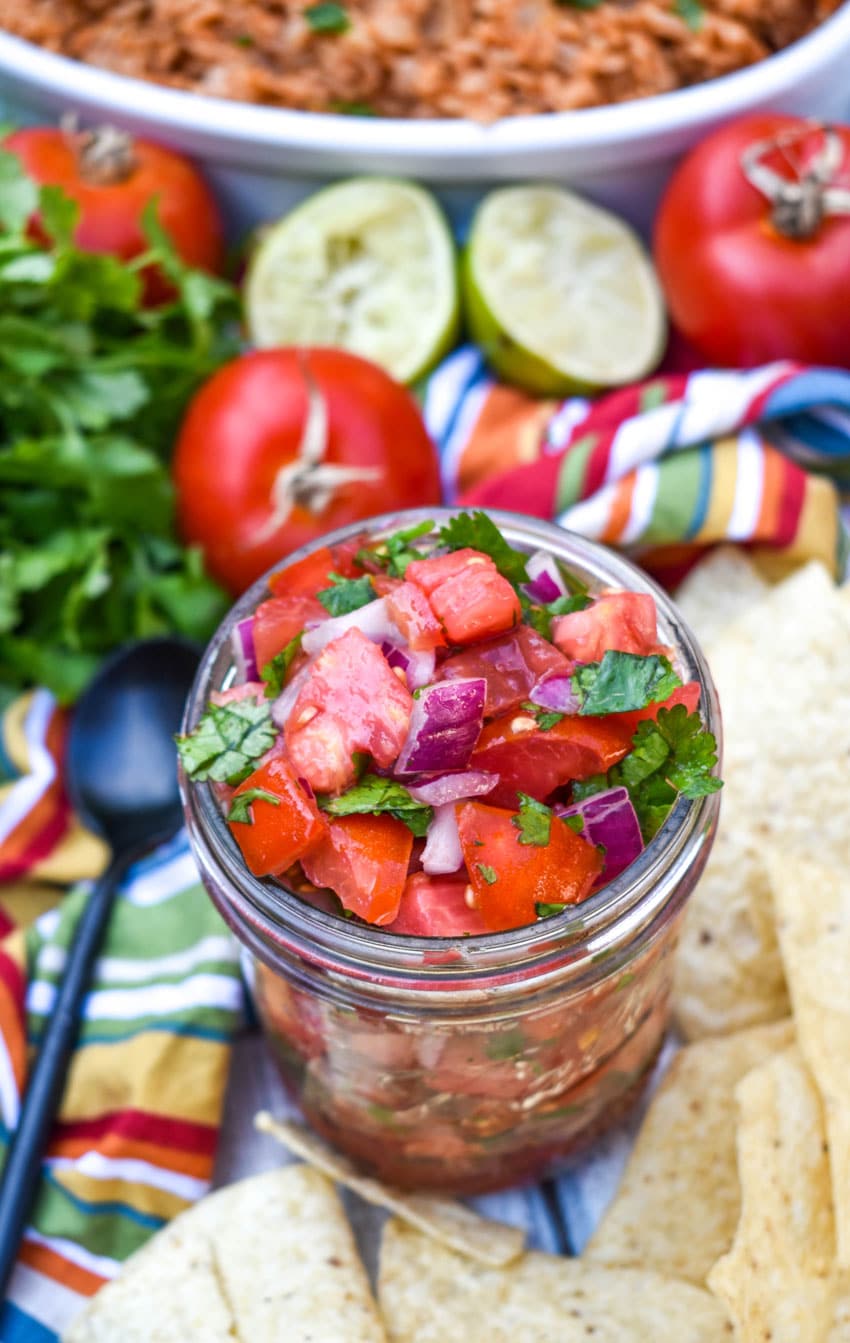 homemade pico de gallo in a small glass jar