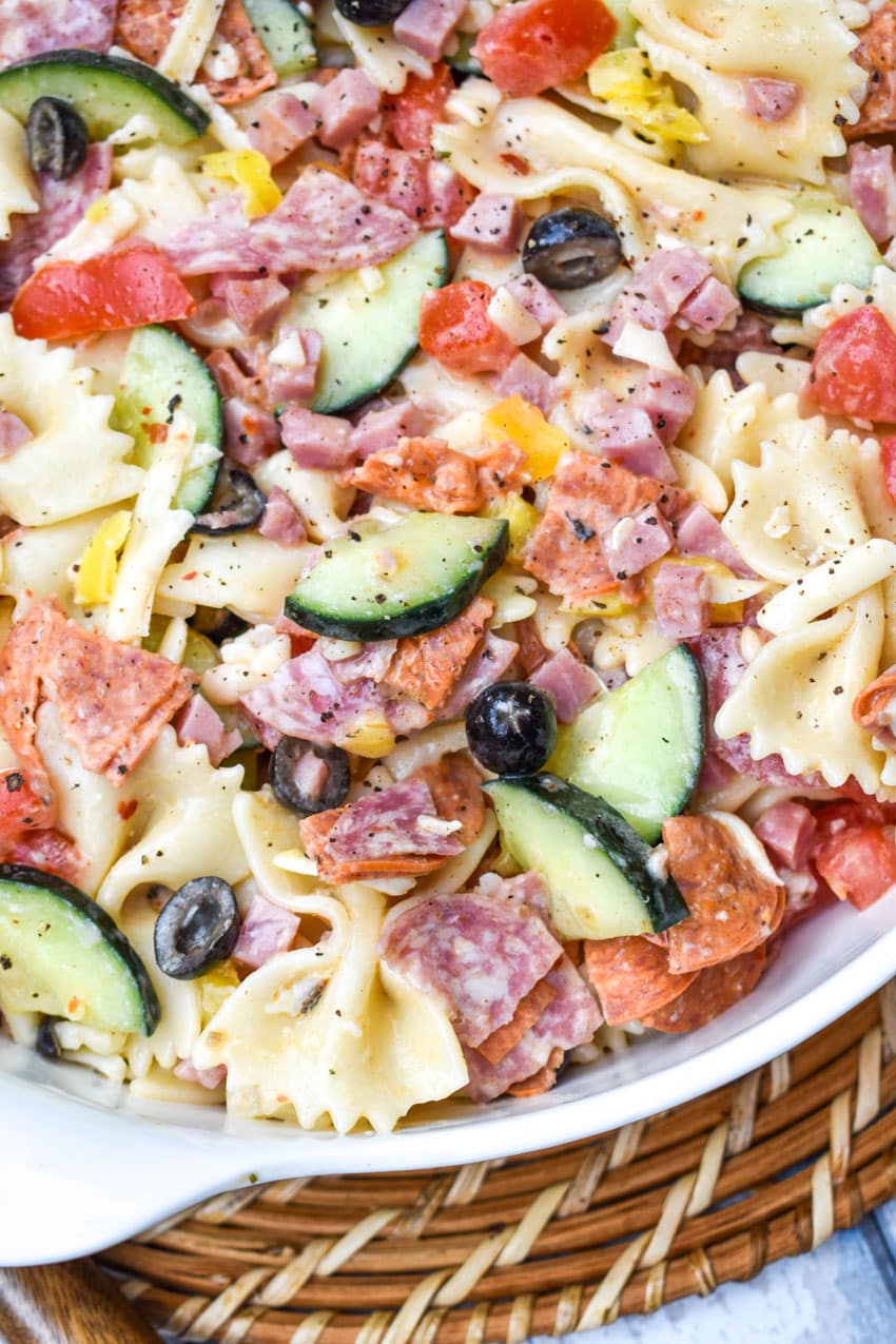 italian pasta salad in a large white serving bowl