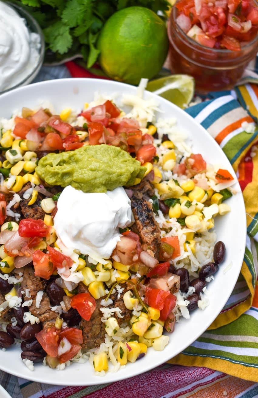 homemade burrito bowl in a shallow white bowl