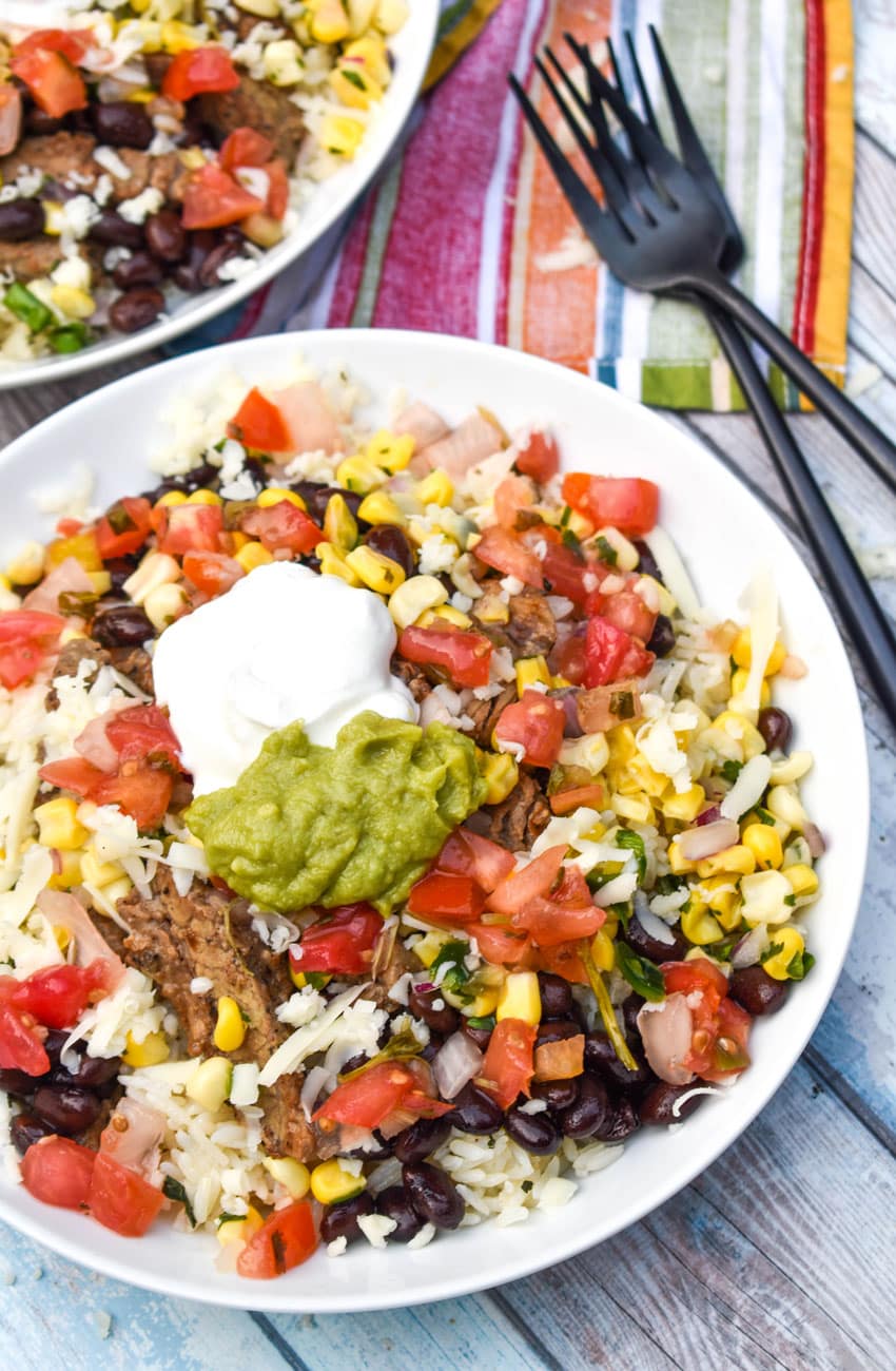 homemade burrito bowl in a shallow white bowl