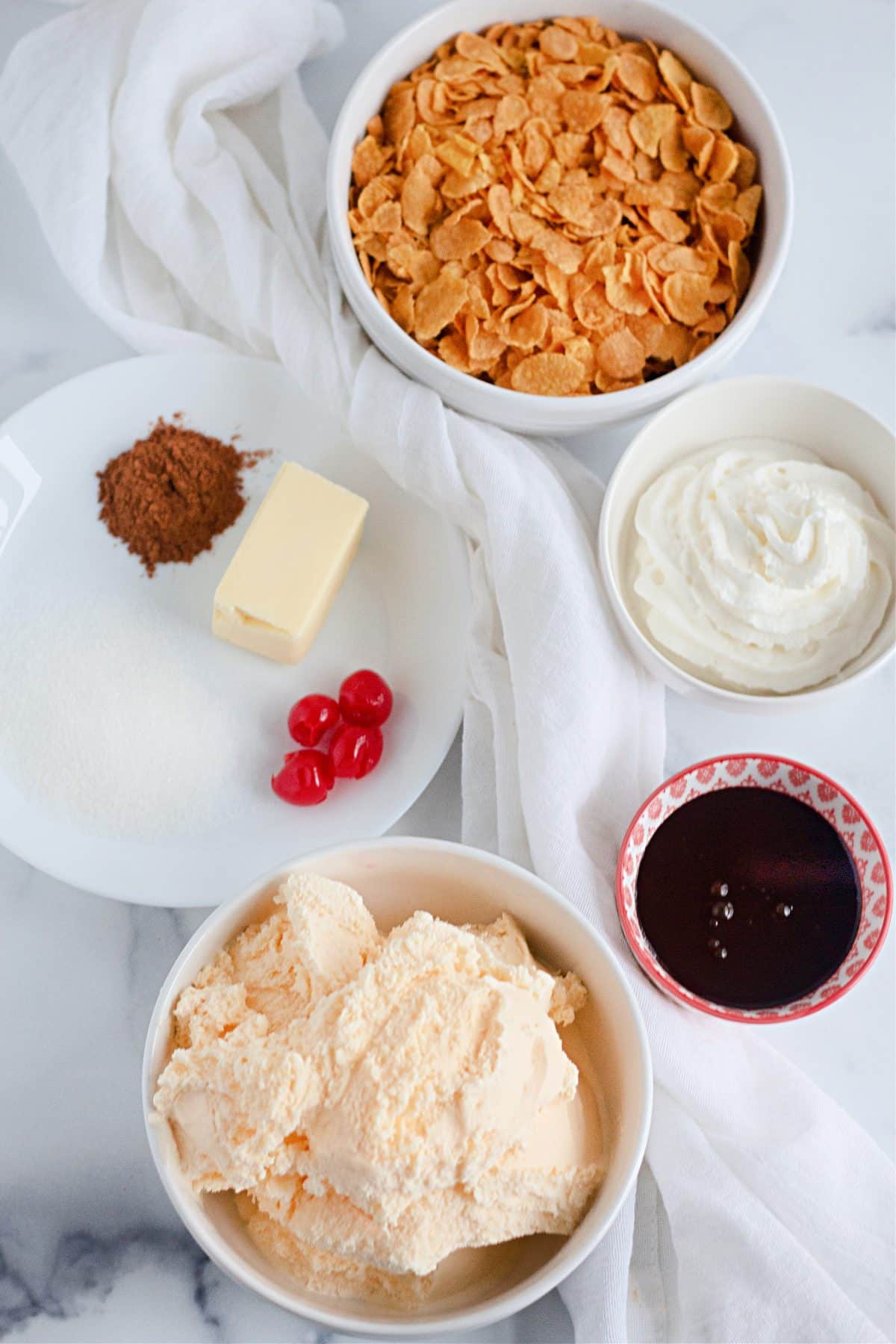 an overhead image showing the measured ingredients needed to make a batch of fried ice cream