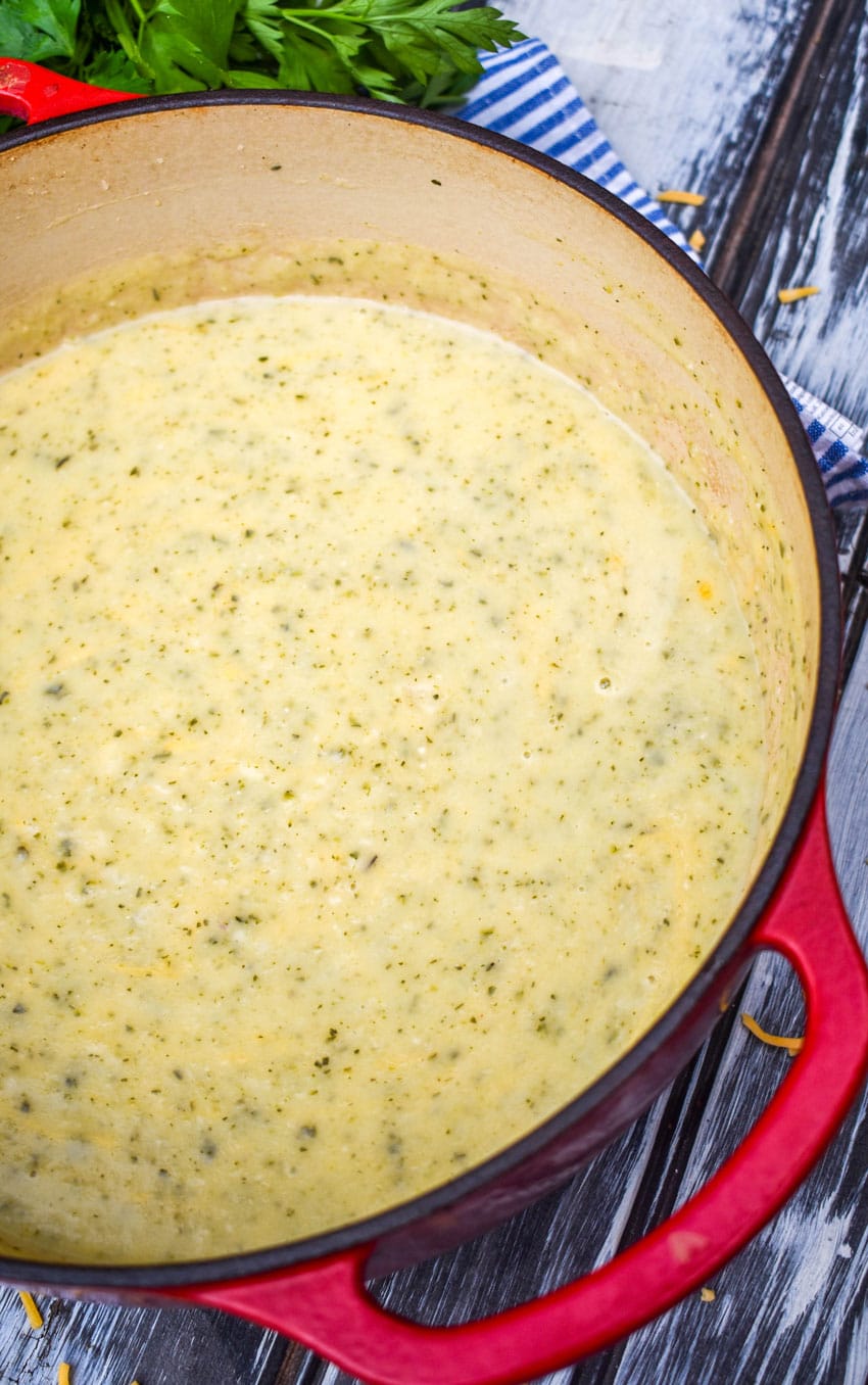 creamy zucchini soup in a red cast iron pot