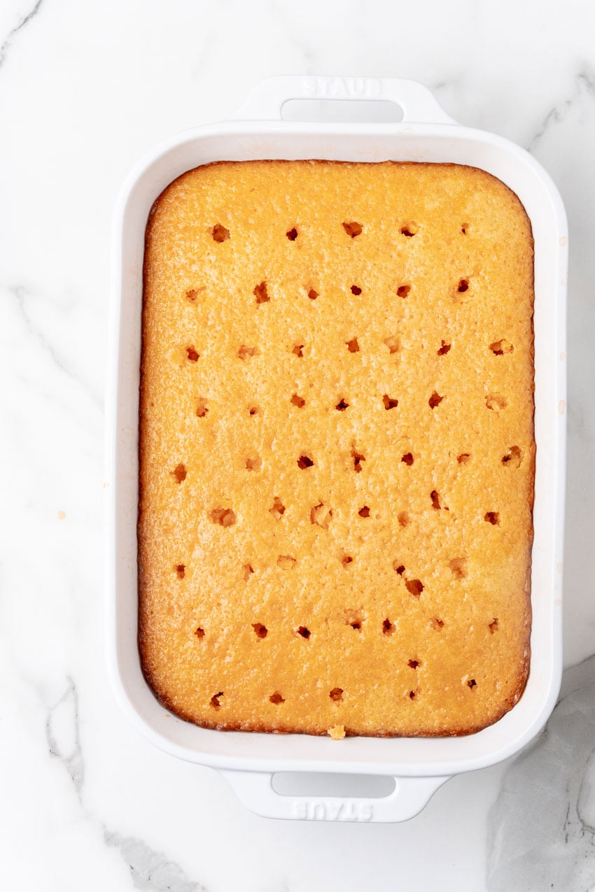 orange jello poured over the holes poked in a baked yellow cake