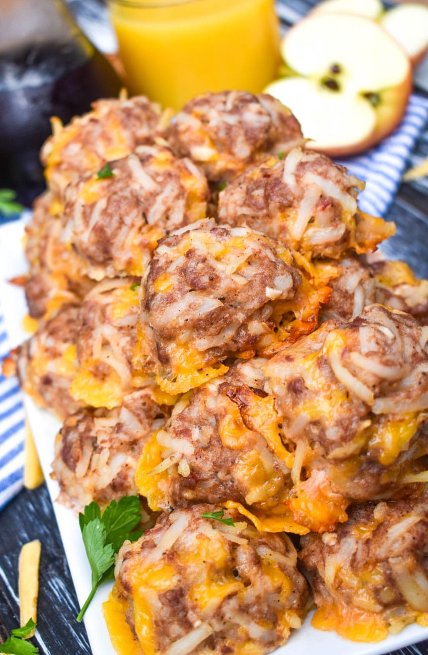 a pile of breakfast sausage balls on a white serving platter