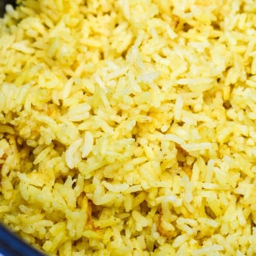 easy yellow rice in the bowl of a pressure cooker