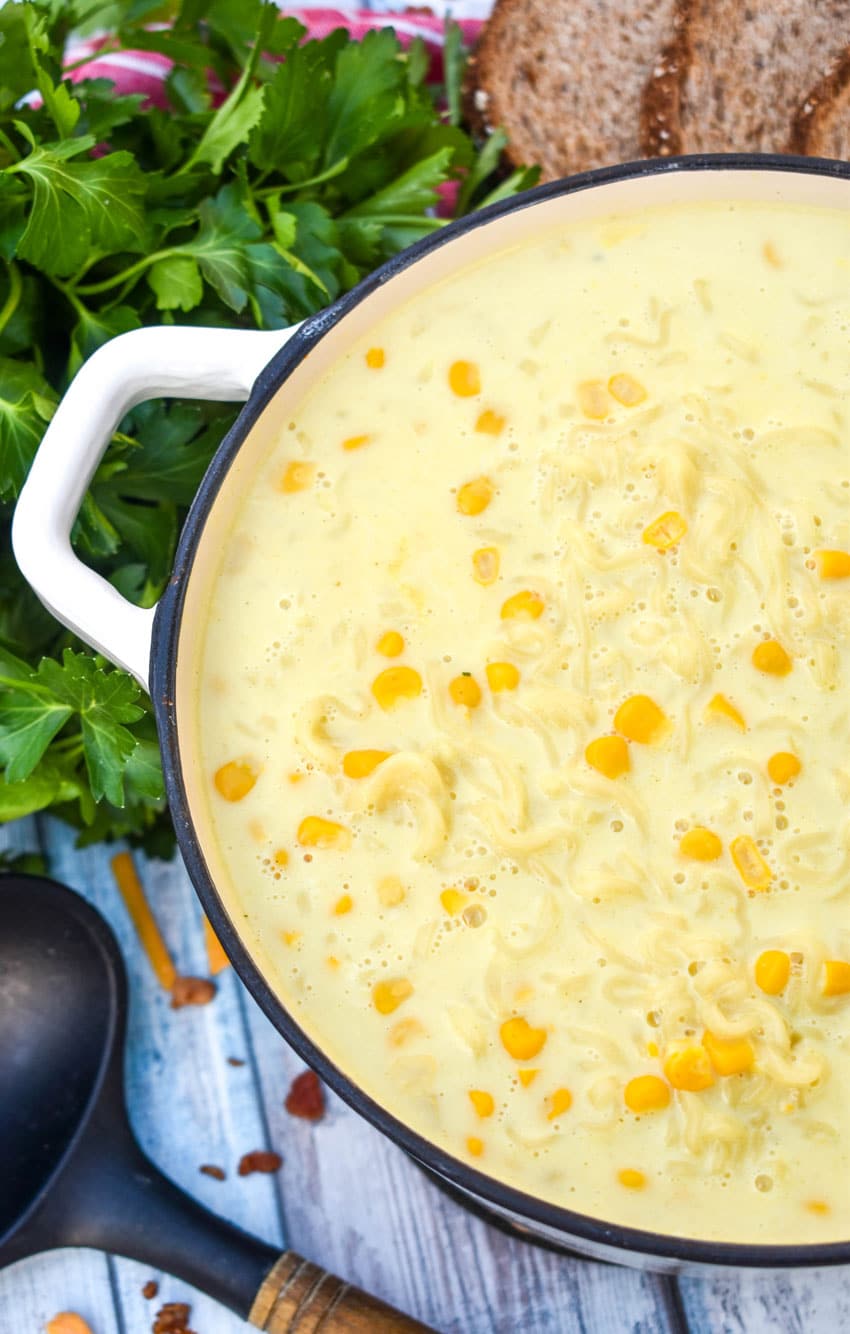ramen noodle chowder in a white cast iron pot