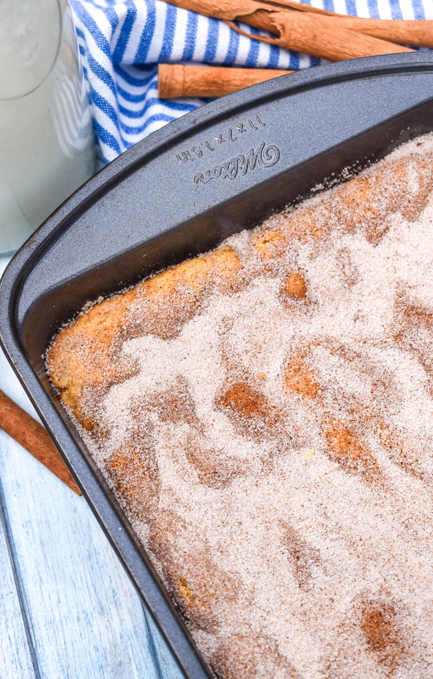 cake mix churro bars in a metal brownie pan