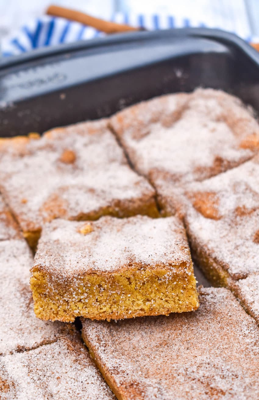 cake mix churro bars in a metal brownie pan