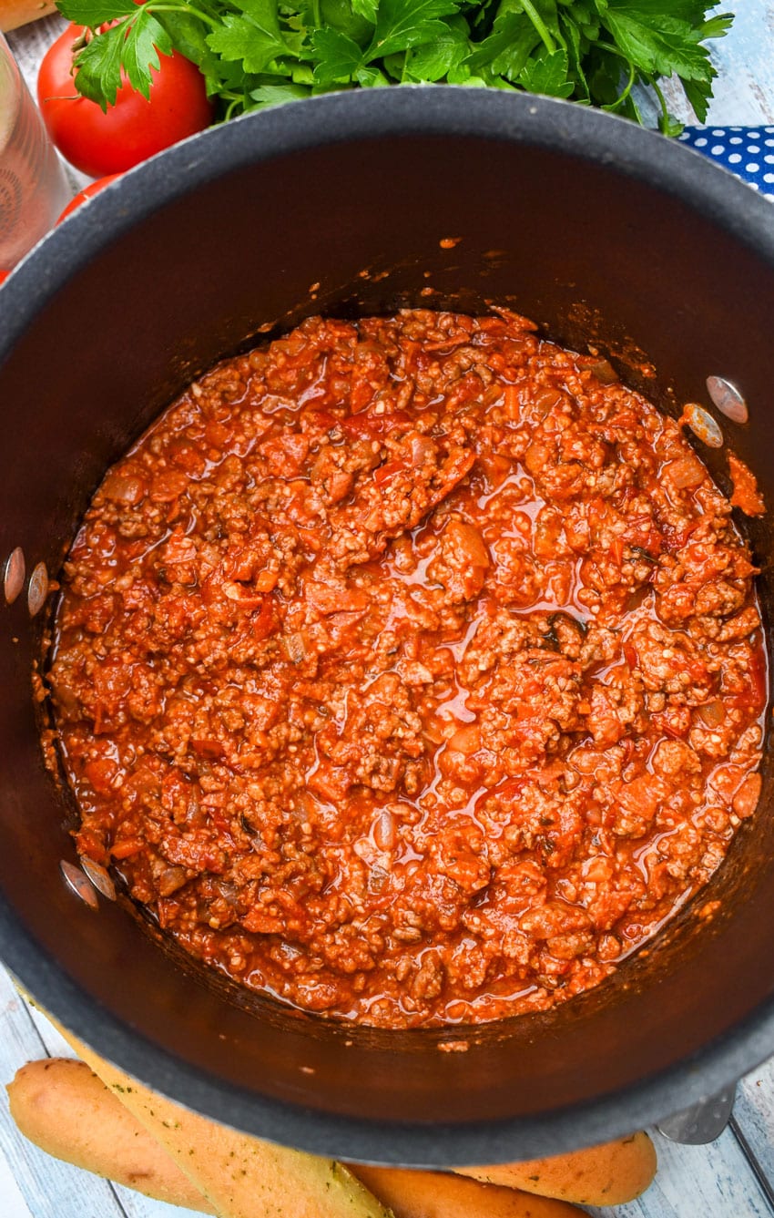 THREE MEAT PASTA SAUCE IN A BLACK POT