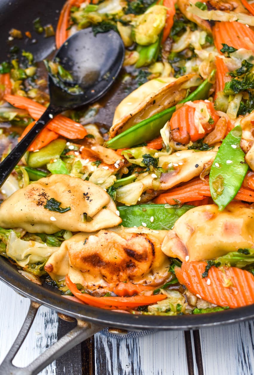 quick pot sticker stir fry in a black skillet