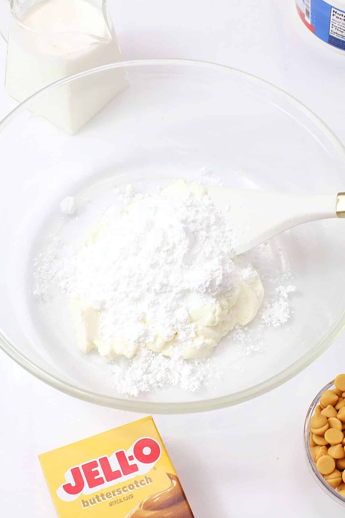 powdered pudding being folded into whipped topping