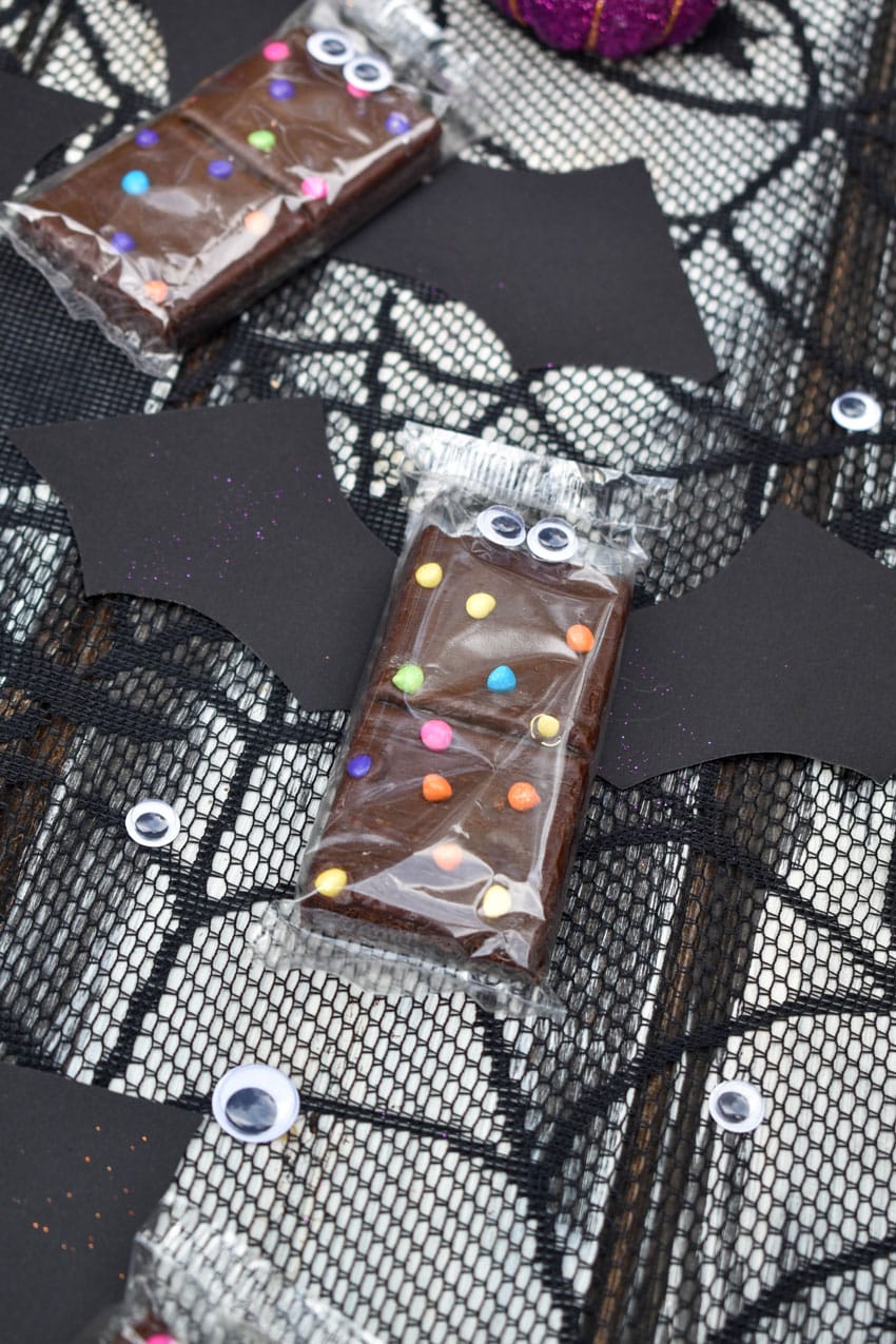 cosmic brownie bats on a black spider web table cloth