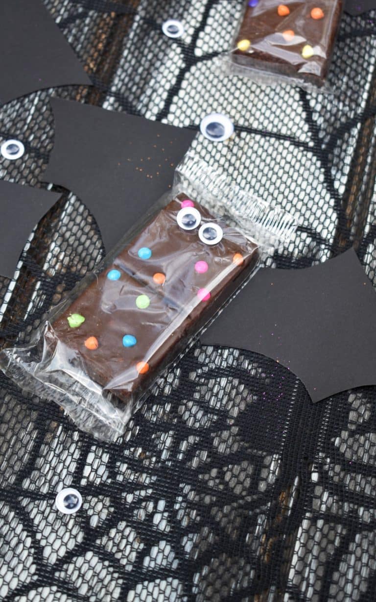 cosmic brownie bats on a black spider web table cloth