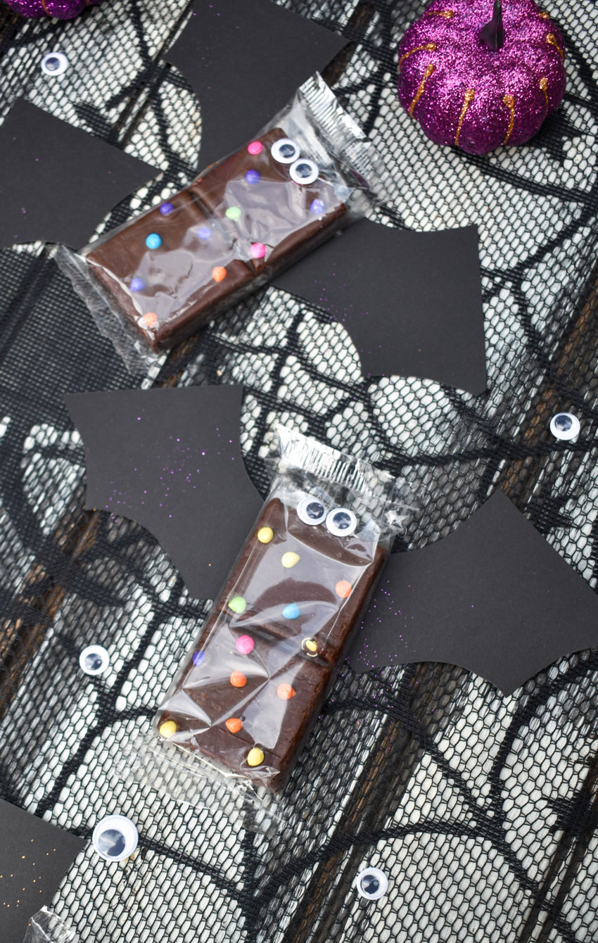 cosmic brownie bats on a black spider web table cloth