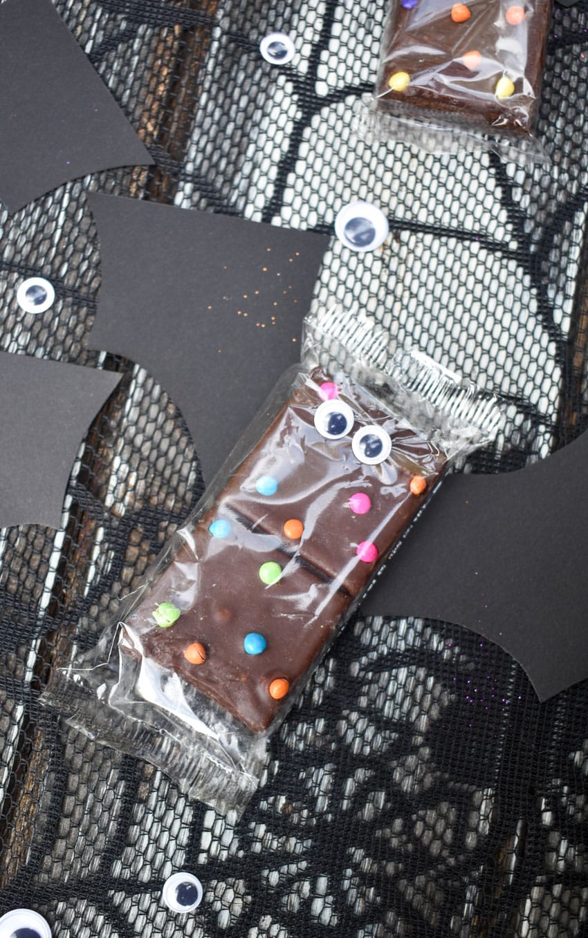 cosmic brownie bats on a black spider web table cloth