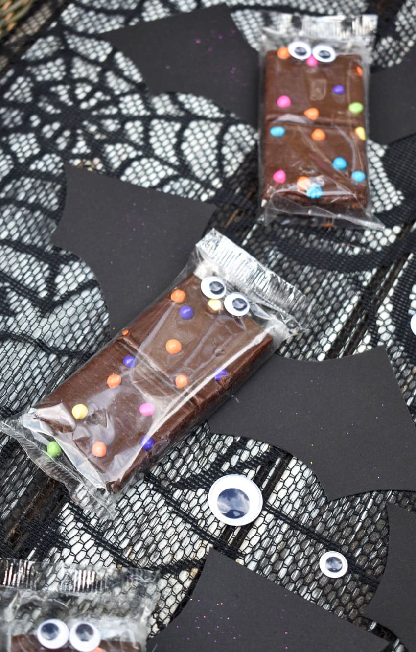 cosmic brownie bats on a black spider web table cloth
