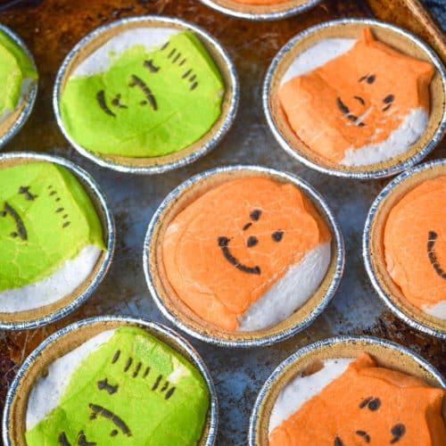 halloween peeps mini s'mores pies on a metal baking sheet